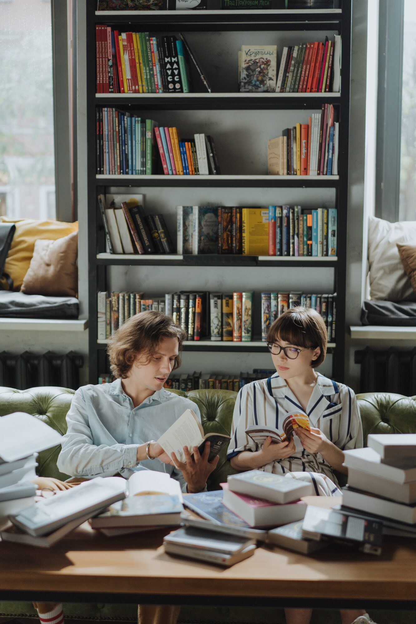 Man and woman talking on the sofa.
