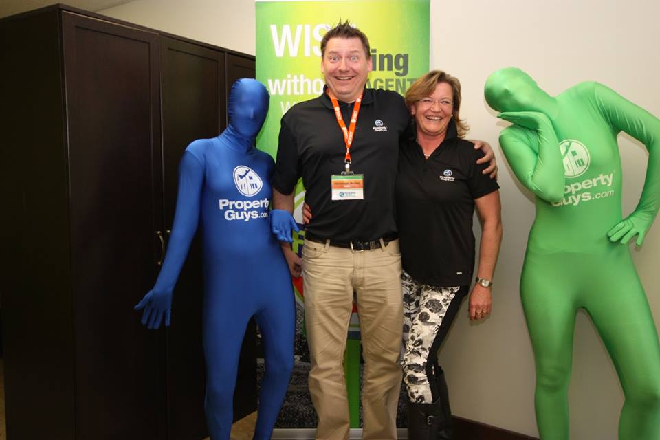 Chistoph and Birgit Braier with PropertyGuys.com morph suits