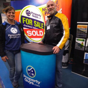 Rick Davies at trade show with PropertyGuys.com