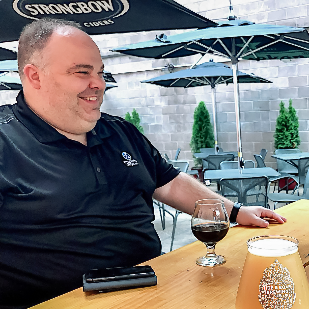 Jeff Cormier on a patio bar